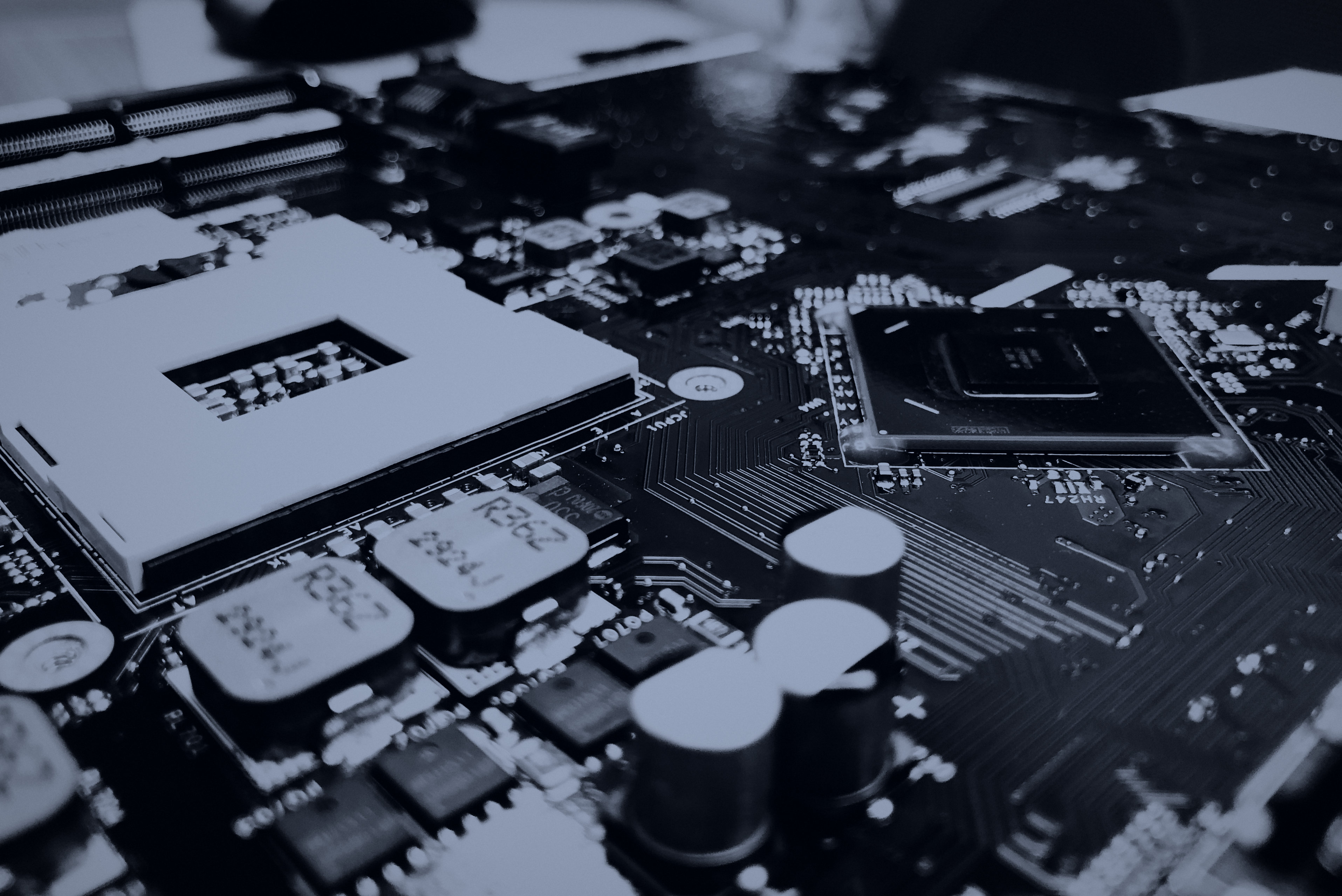 Macro of a motherboard in navy and steel tones